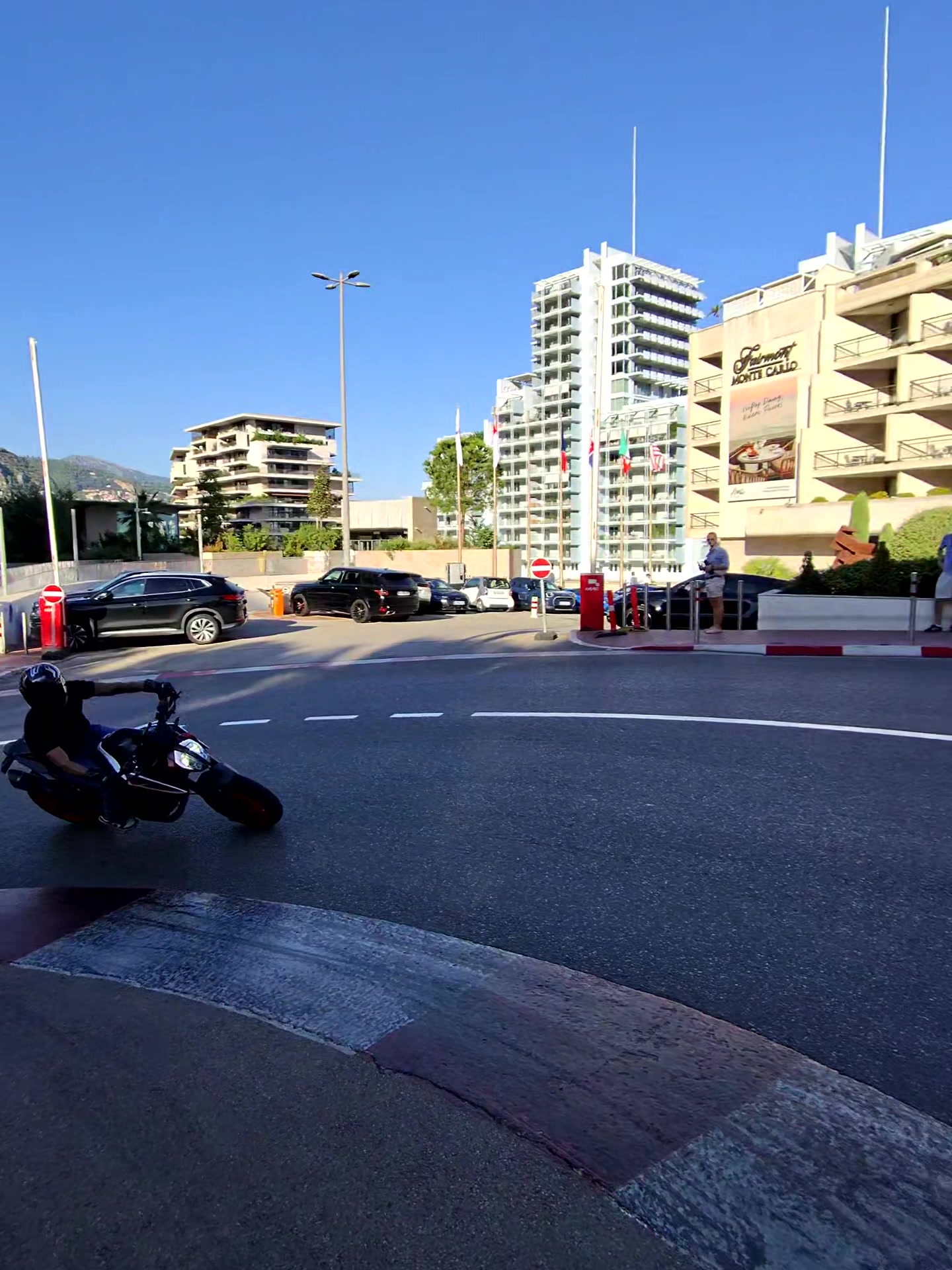 Motorcyclist leaning through the Fairmont Hairpin in Monte Carlo, Monaco