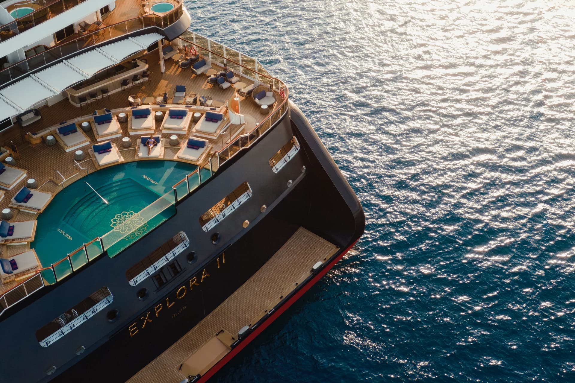 Aerial view of the aft pool and sun deck on Explora II, Explora Journeys